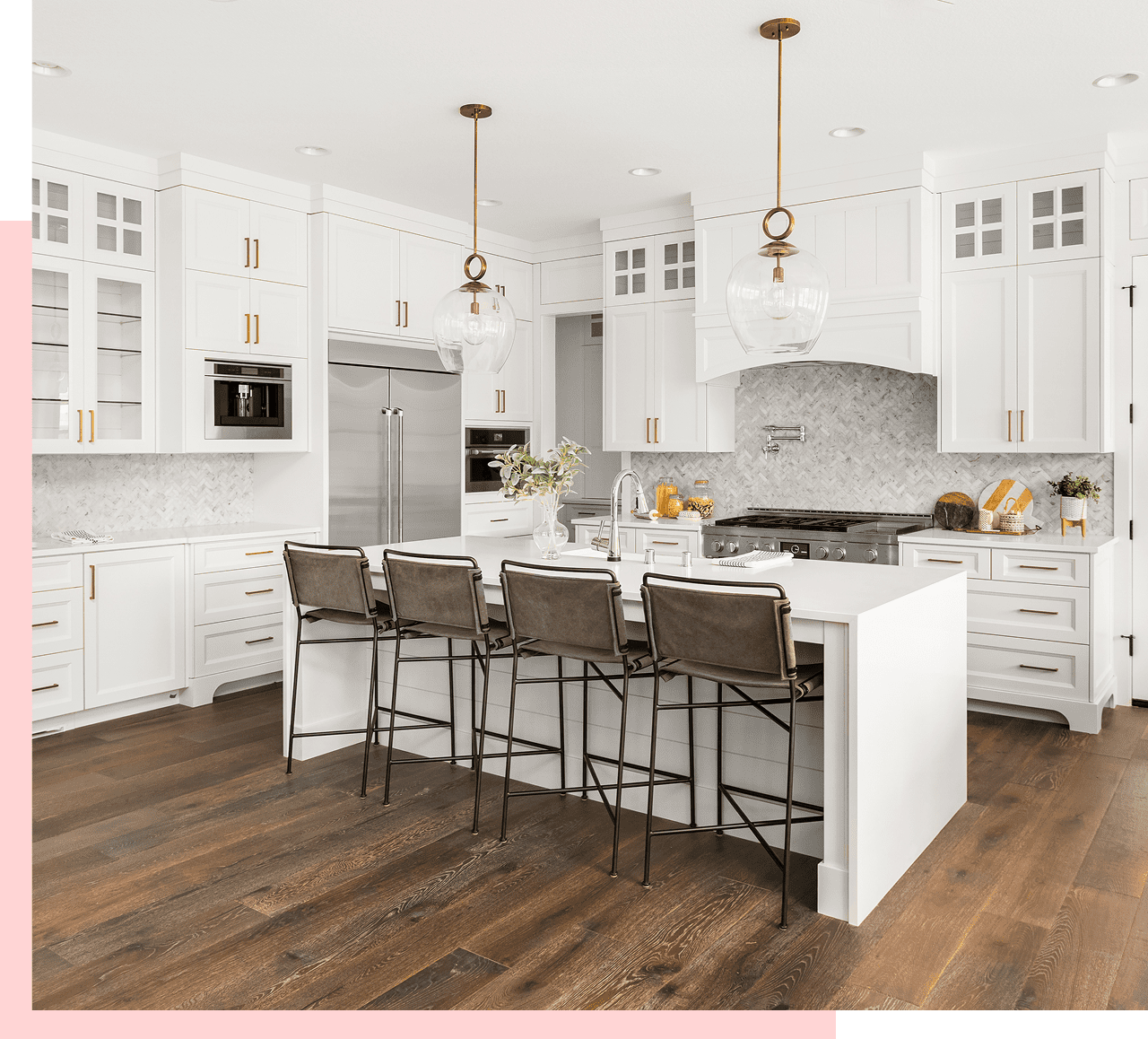 Modern kitchen with white cabinets and island.